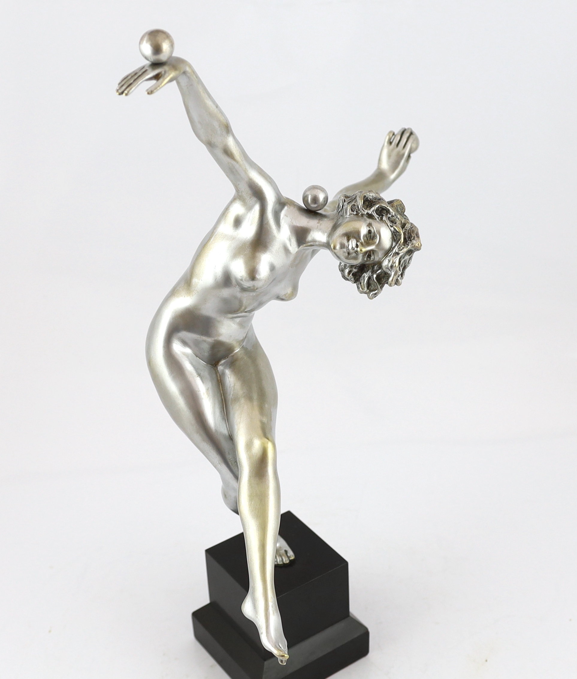 Attributed to Claire Colinet, an Art Deco silvered bronze figure of a nude acrobatic dancer, overall 53cm high